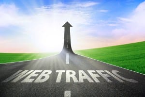 A road turning into an arrow rising upward symbolizing growth and improvement of web traffic
